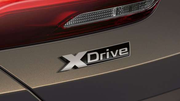 BMW M850i xDrive Dravitgrau metallic, logo xDrive. BMW M850i xDrive Dravitgrau metallic, logo xDrive.