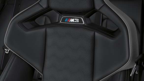 BMW M3 Competition Touring G81 tout cuir Merino Schwarz vue en gros plan siège baquet M Carbon avec logo M3