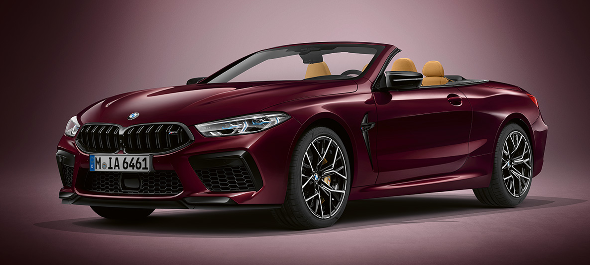 BMW Individual M8 Cabrio en BMW Individual Ametrine metallic. BMW Individual M8 Cabrio en BMW Individual Ametrine metallic, vue de trois quarts avant.