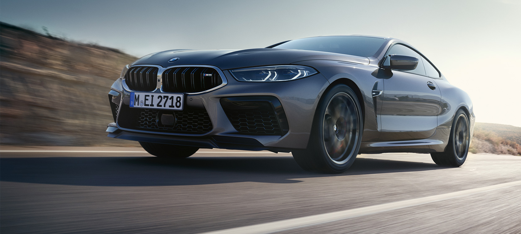BMW M8 Coupé F92 LCI Facelift 2022 Skyscraper grey metallic three-quarter side view low angle shot