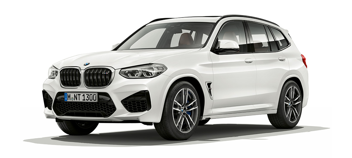 BMW X3 M Competition, vue de trois quarts de profil. Extérieur de la BMW X3 M en Alpinweiß, vue de trois quarts de profil.